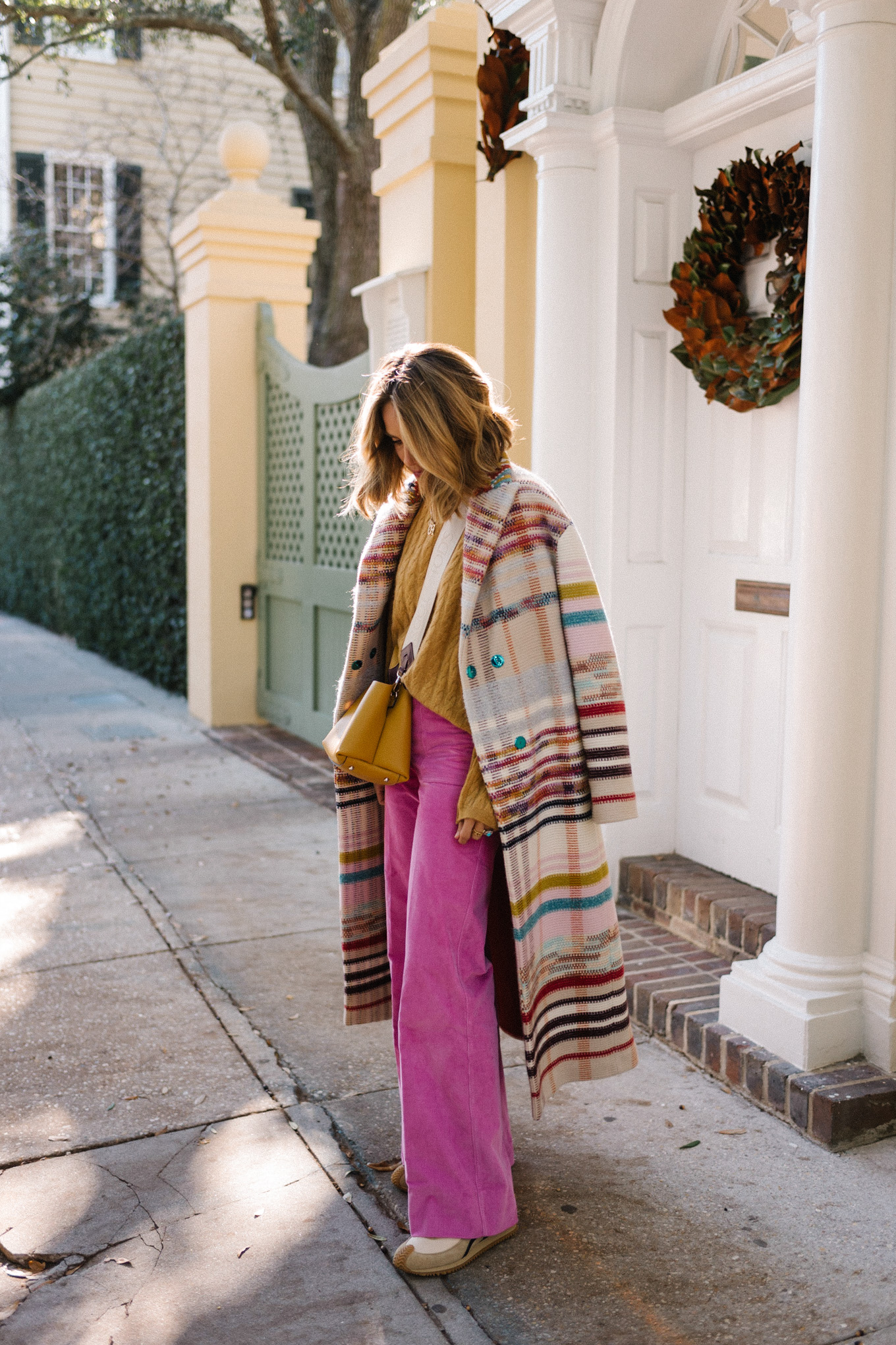 rainbow striped coat gold sweater pink flared pants