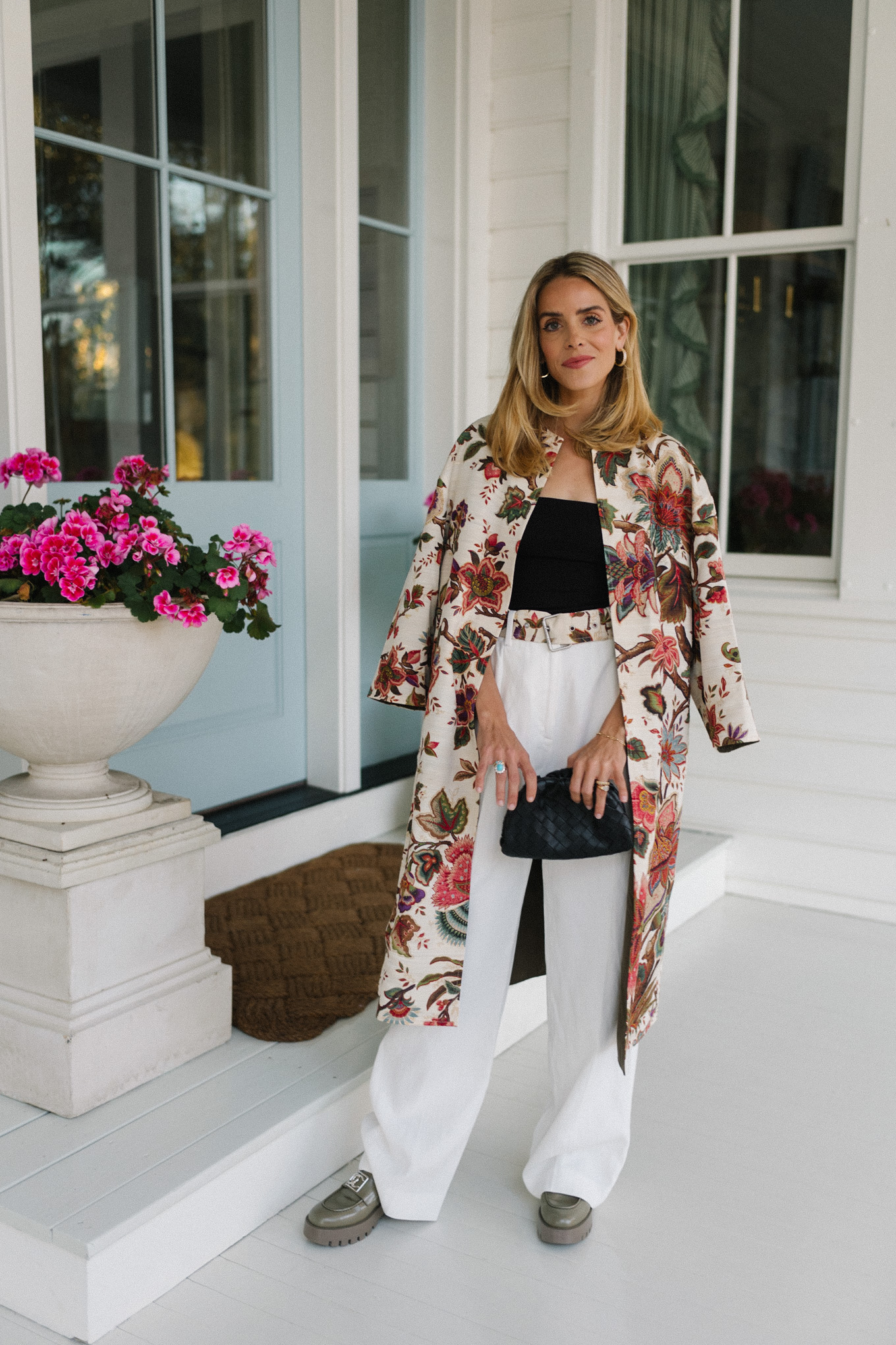 floral coat black top white trousers