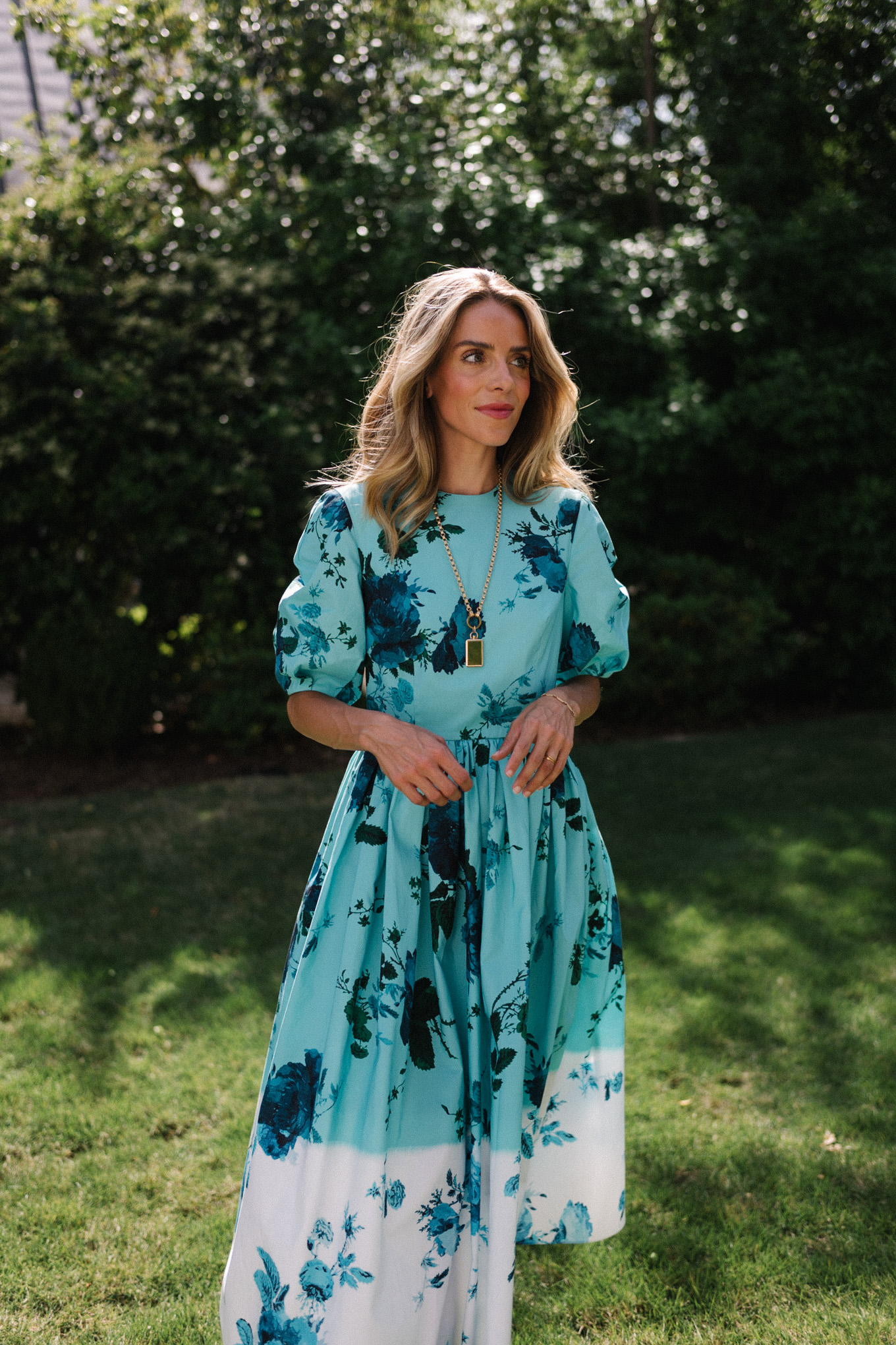 turquoise floral puff sleeved midi dress