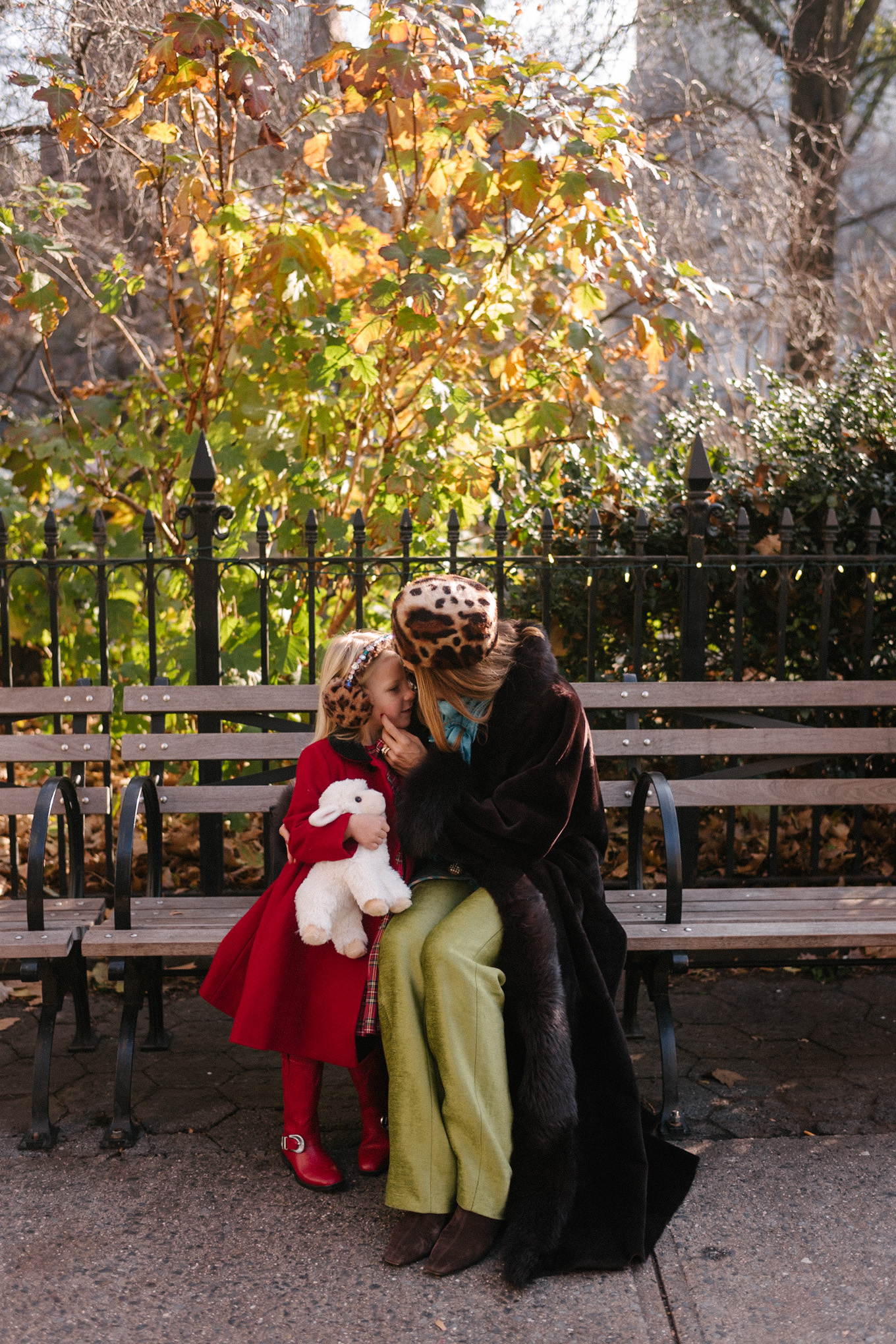 brown shearling coat leopard pill box hat green satin pants turquoise silk scarf