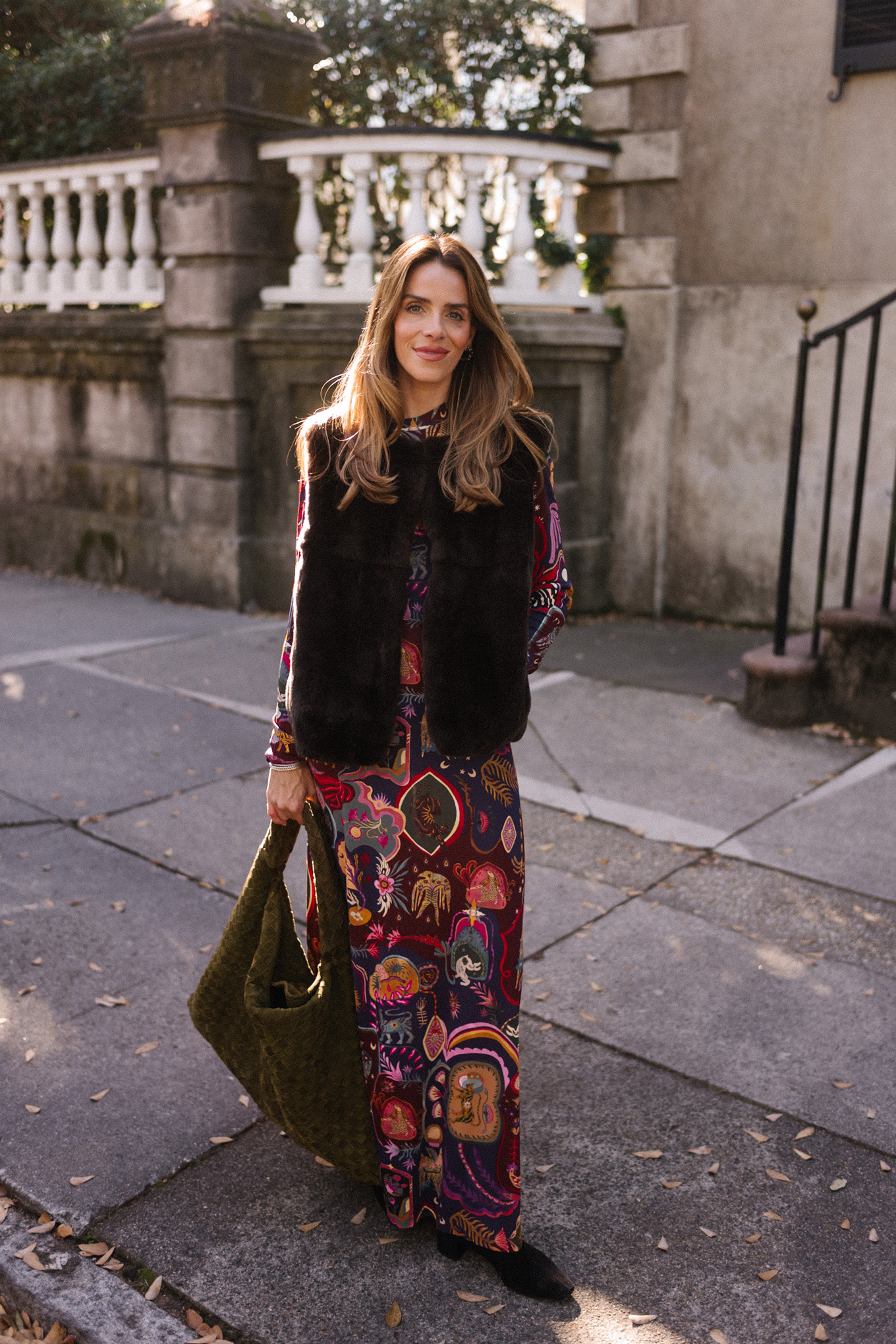 patterned maxi dress faux fur dress suede hobo bag