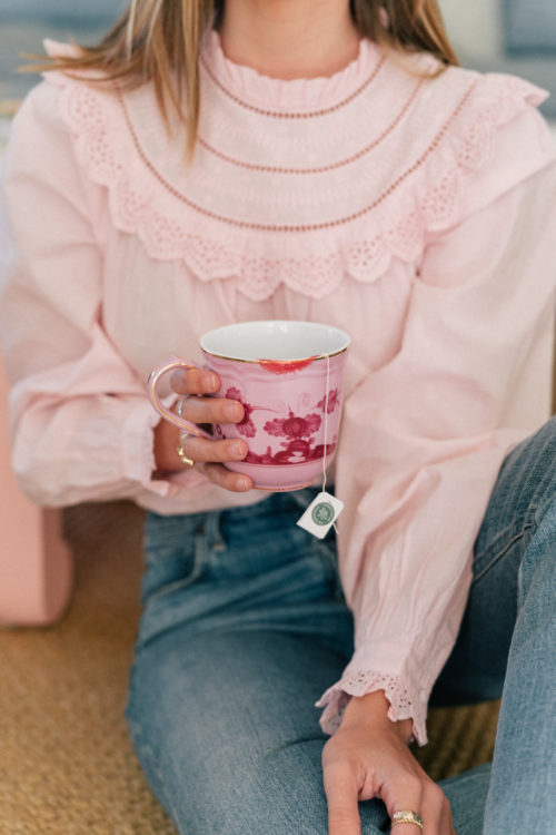 pink top denim red shoes