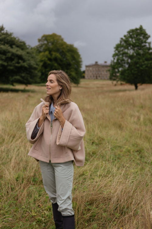 tan wool coat sage pants rain boots