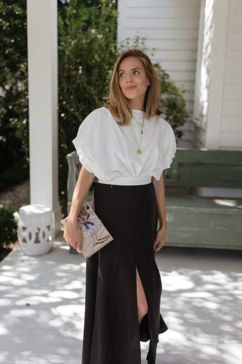cream buttoned jacket white blouse black maxi skirt