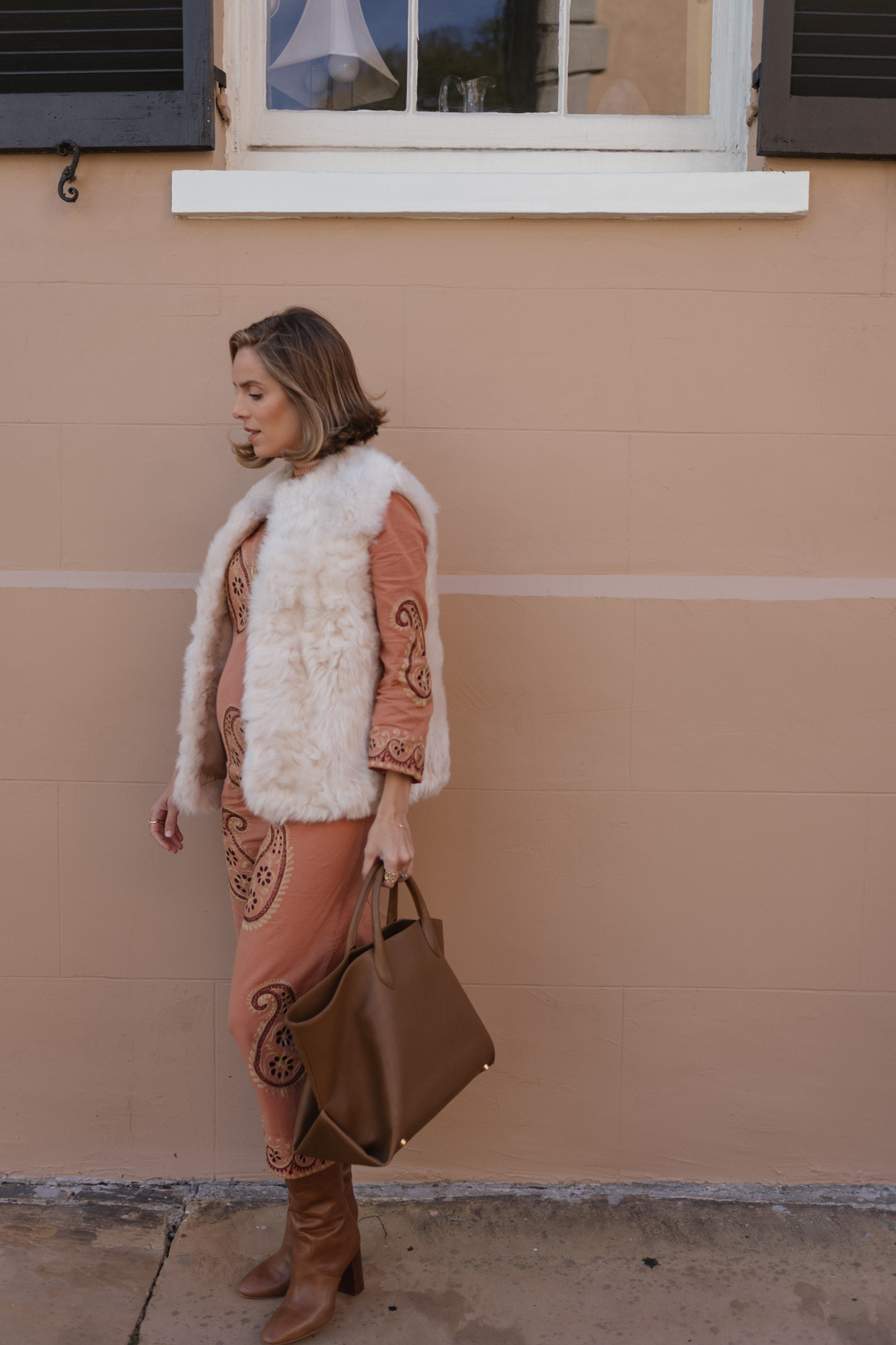 cotton embroidered dress white faux fur vest brown leather boots
