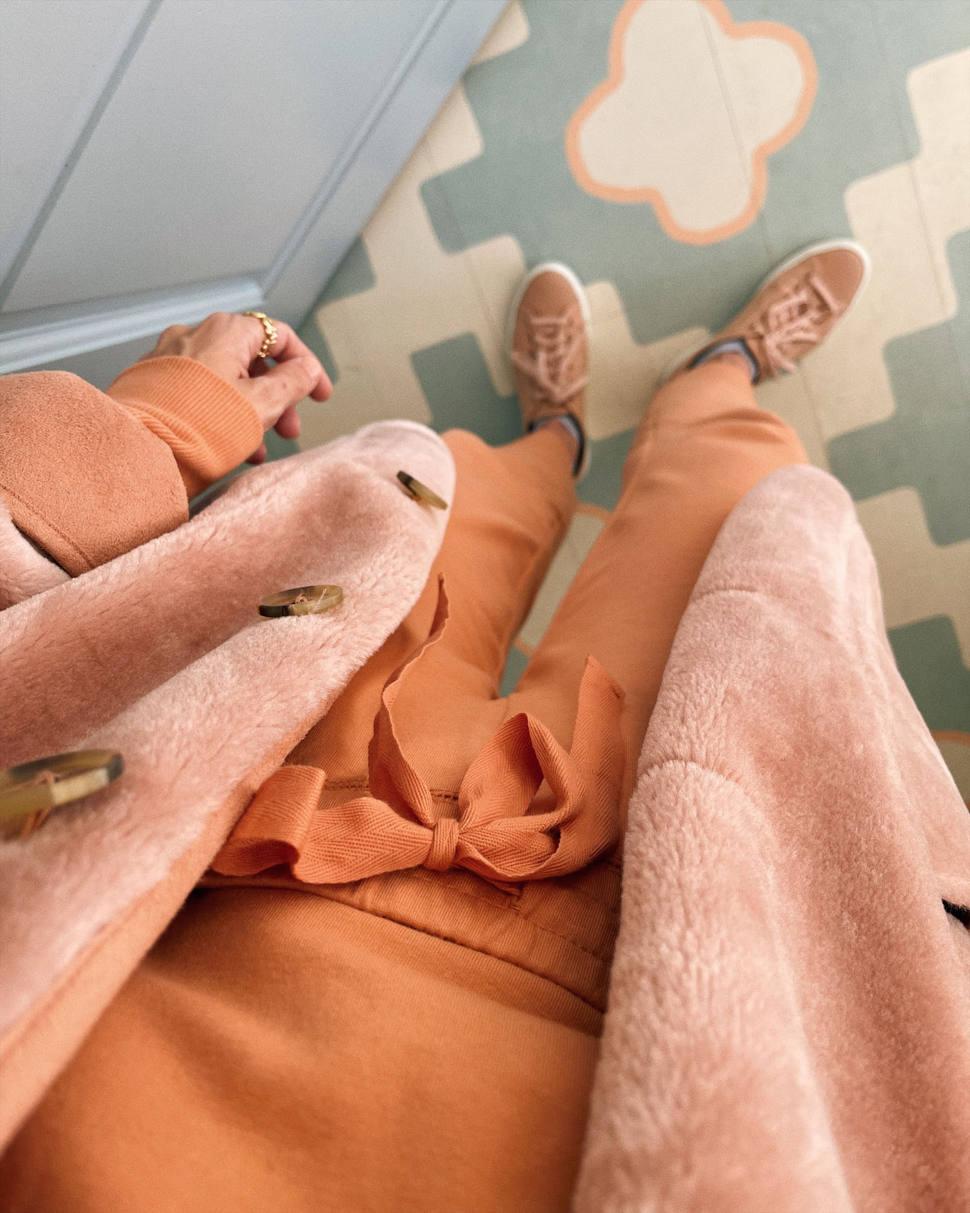 orange sweatshirt sweat pants pink coat