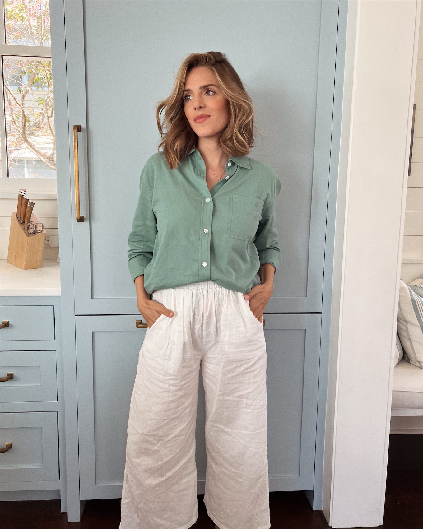teal collared button down white linen pants