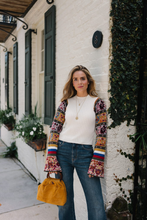 cropped patchwork wool sweater blue denim gold bag