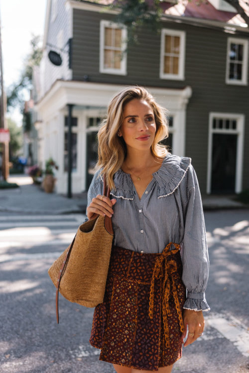 blue collared blouse brown pattern skirt