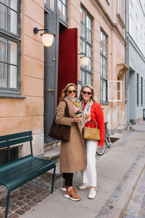 brown wool coat colorful silk scarf brown sneakers