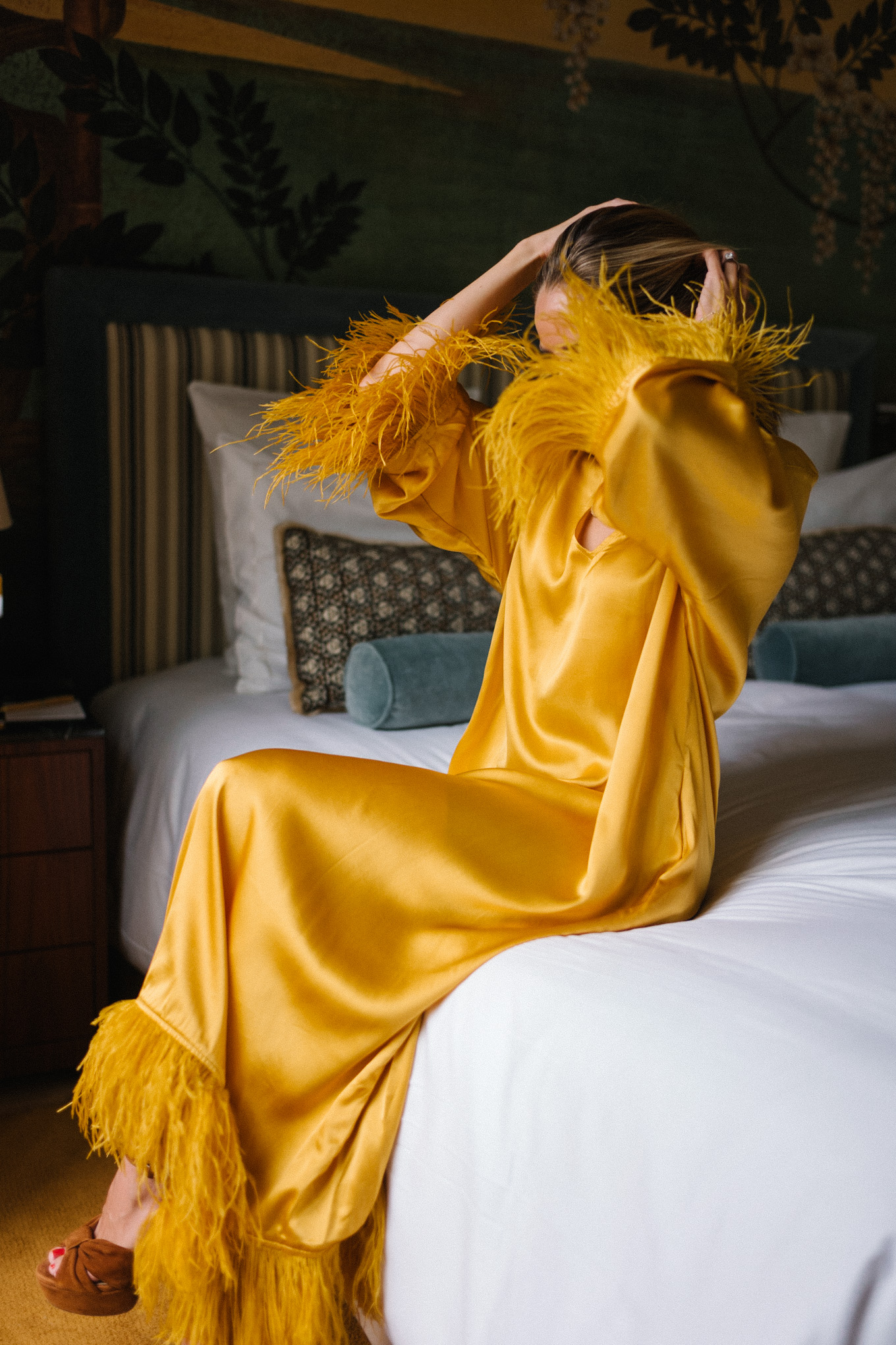 golden feather dress made of silk, brown suede heels