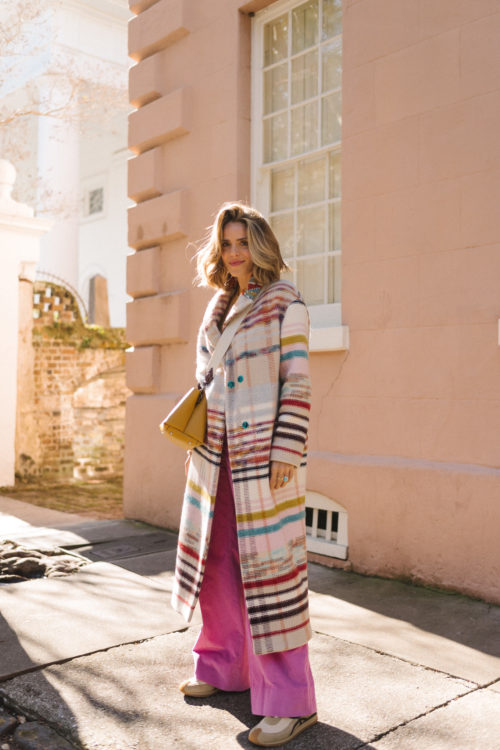 rainbow striped coat gold sweater pink flared pants