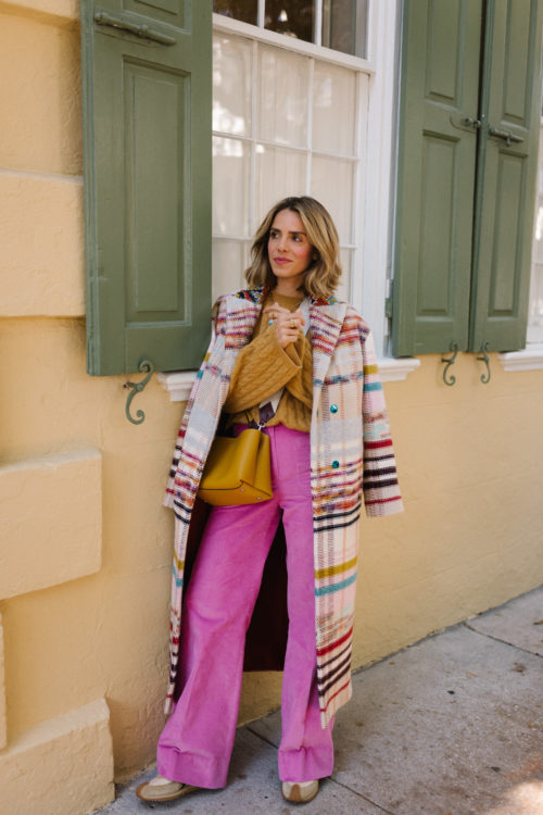 rainbow striped coat gold sweater pink flared pants