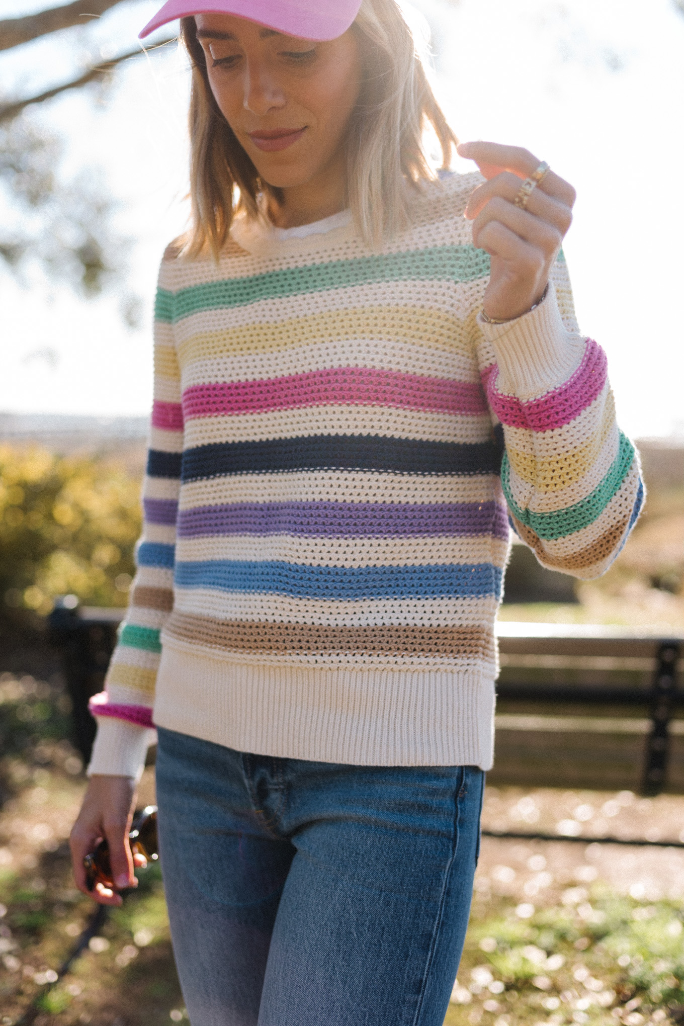 rainbow striped sweater pink hat neutral puffer vest