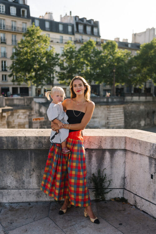 black strapless top red plaid skirt