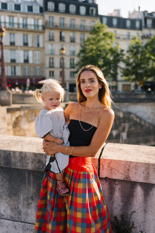 black strapless top red plaid skirt