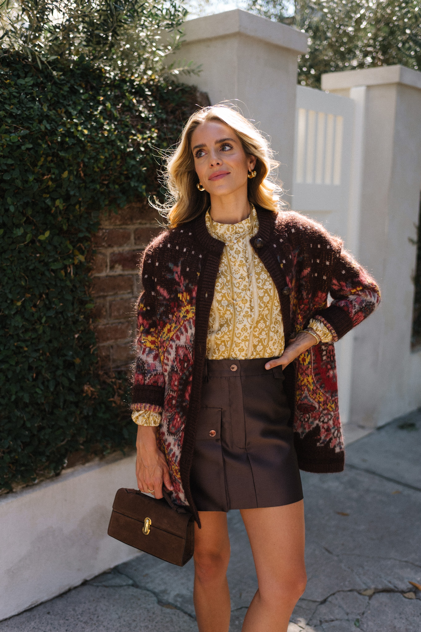maroon cardigan gold floral top brown leather skirt