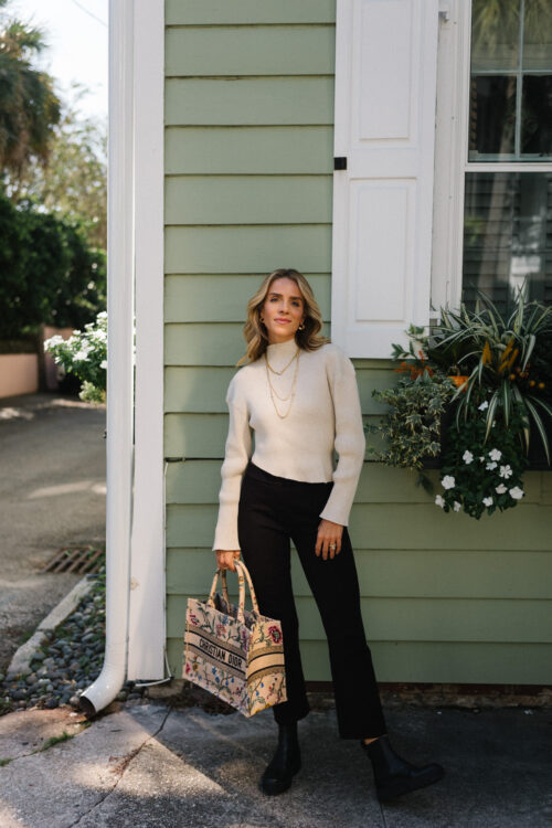 cream asymmetrical sweater black crop flare pants