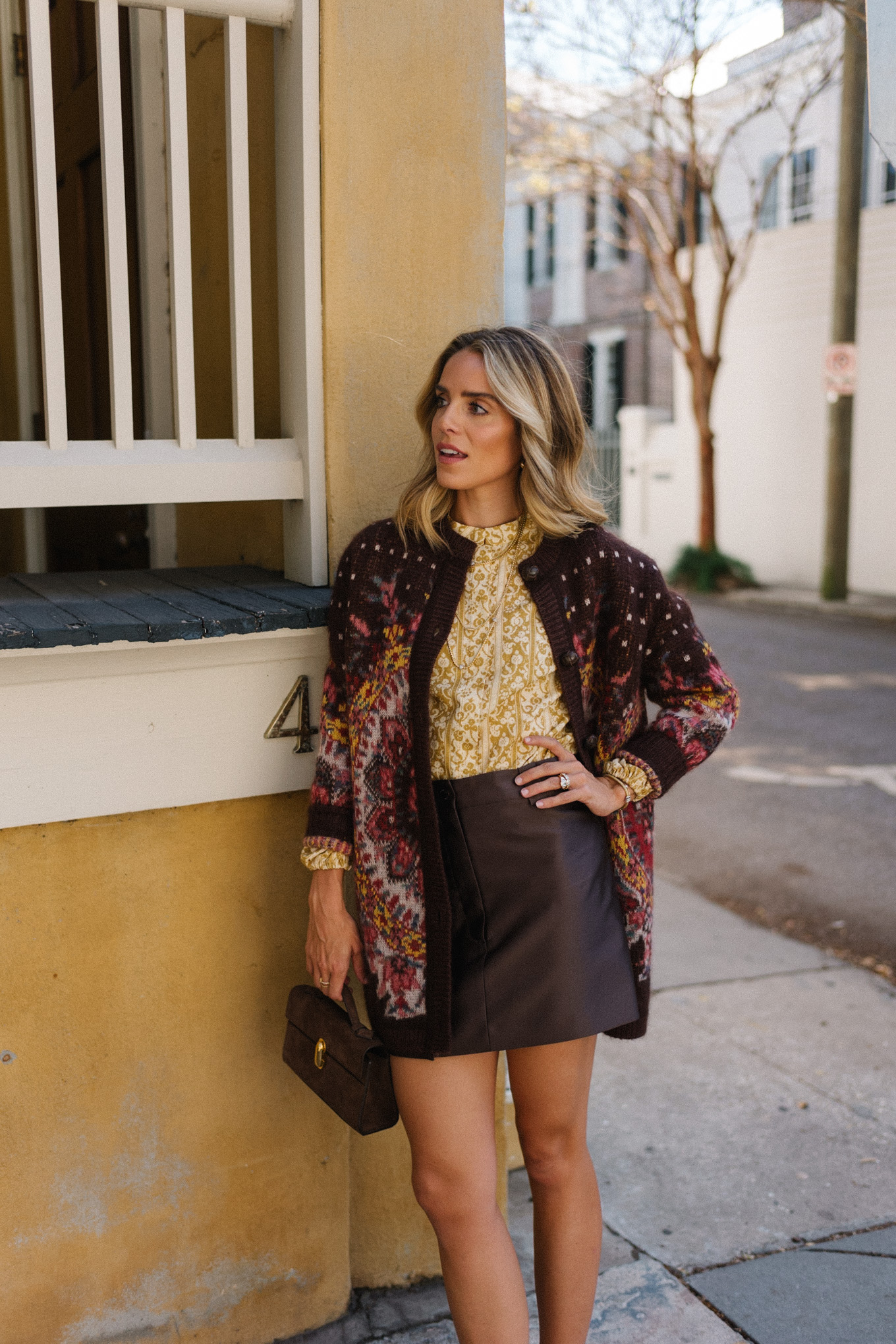 Maroon floral cardigan gold blouse leather skirt