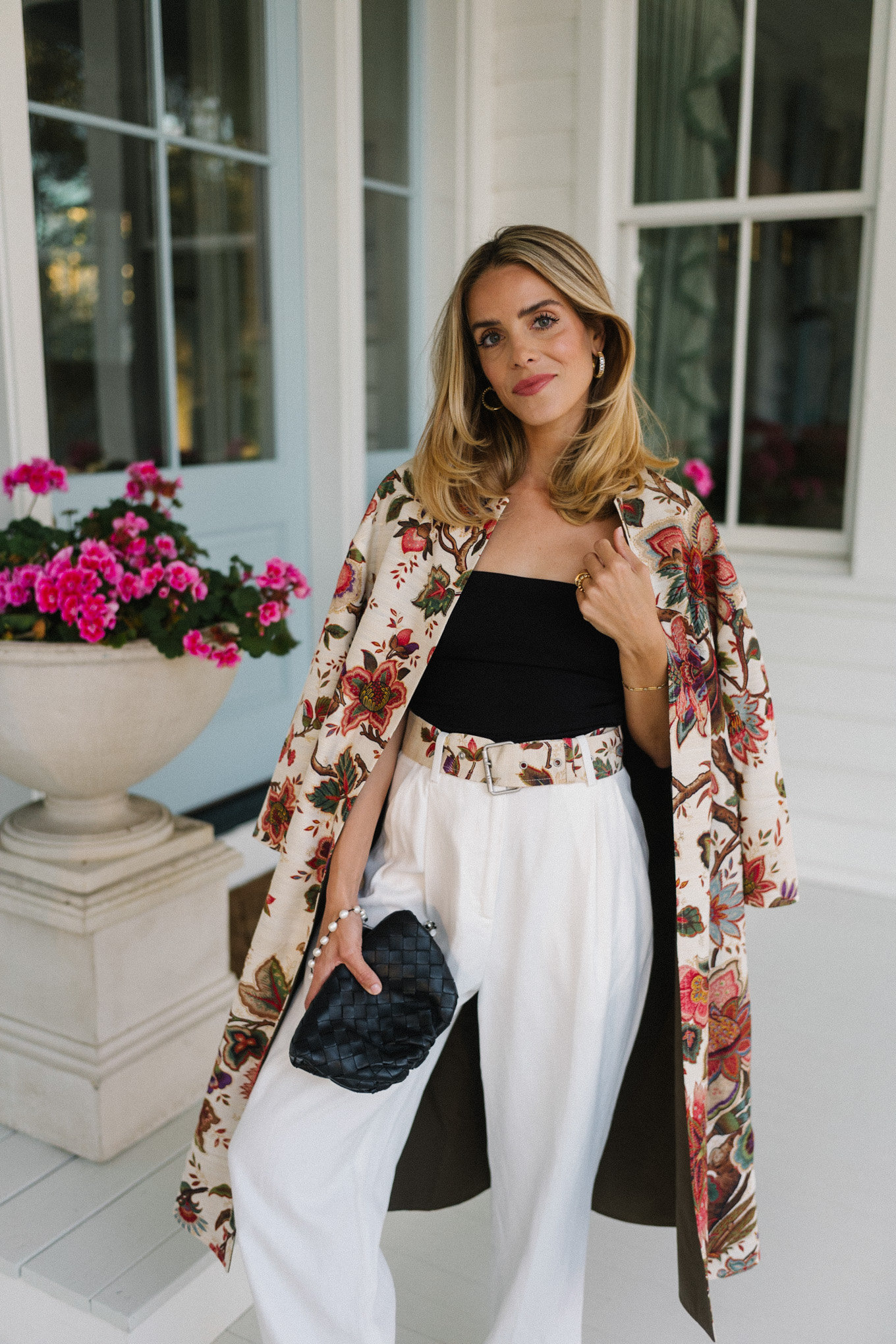 floral coat black top white trousers