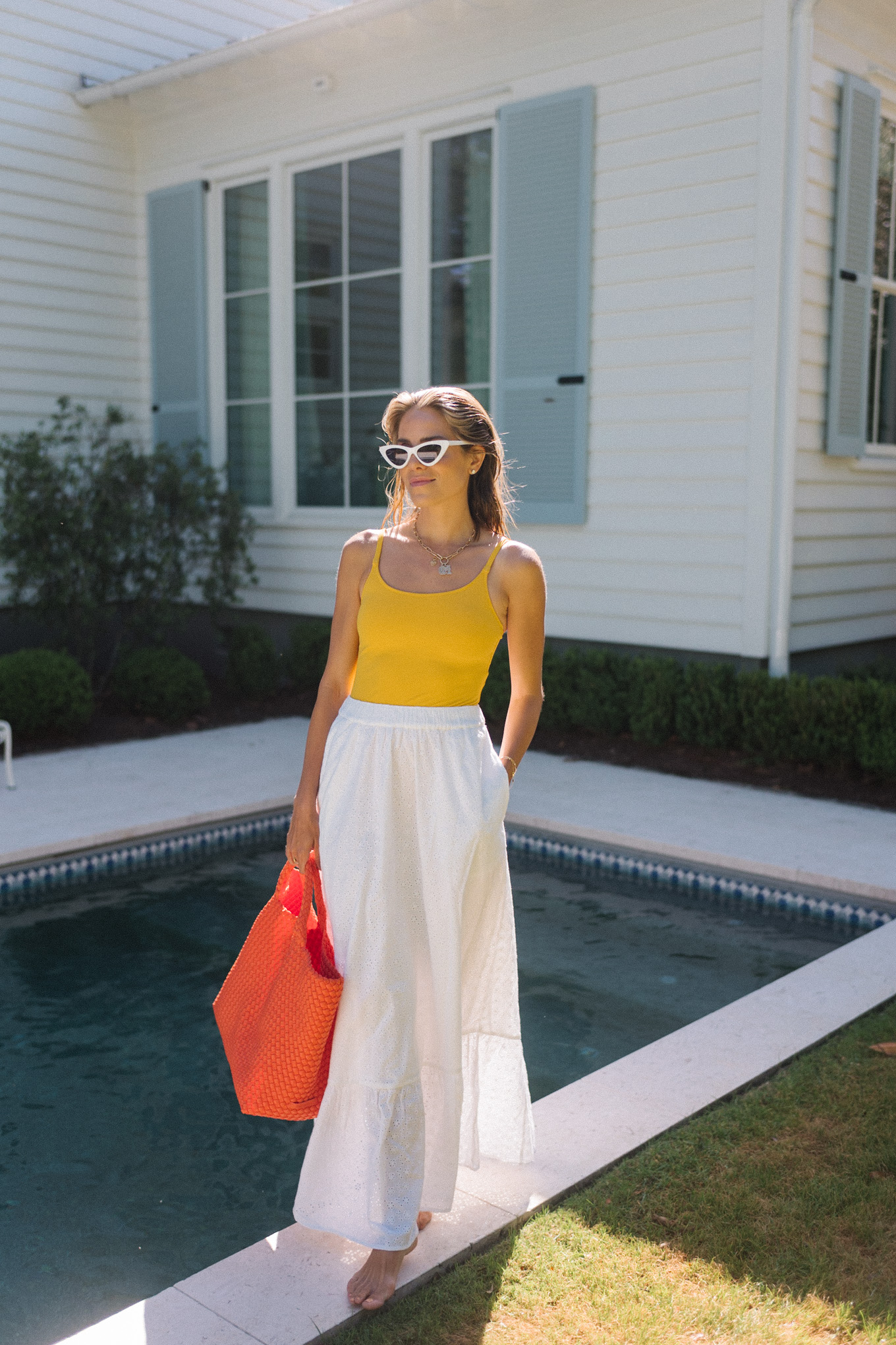 white sunglasses yellow swim white skirt