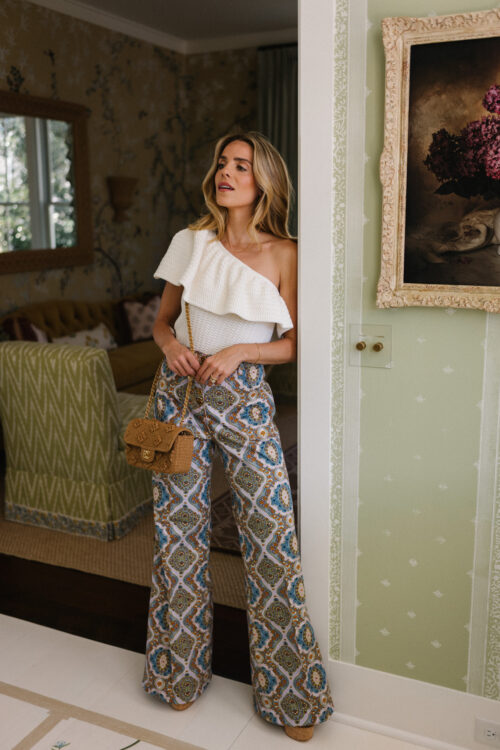 white one shoulder ruffle top printed denim pants