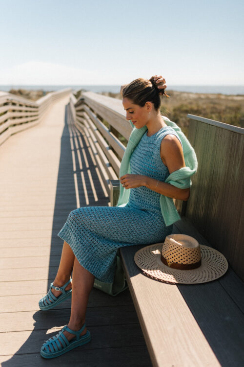 blue knit midi dress blue sandals green sweater straw hat
