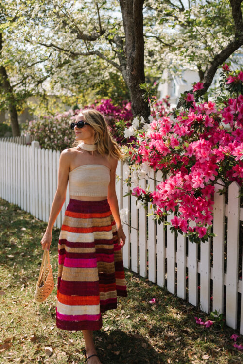 gold knit top orange color block raffia skirt woven tote strappy sandals