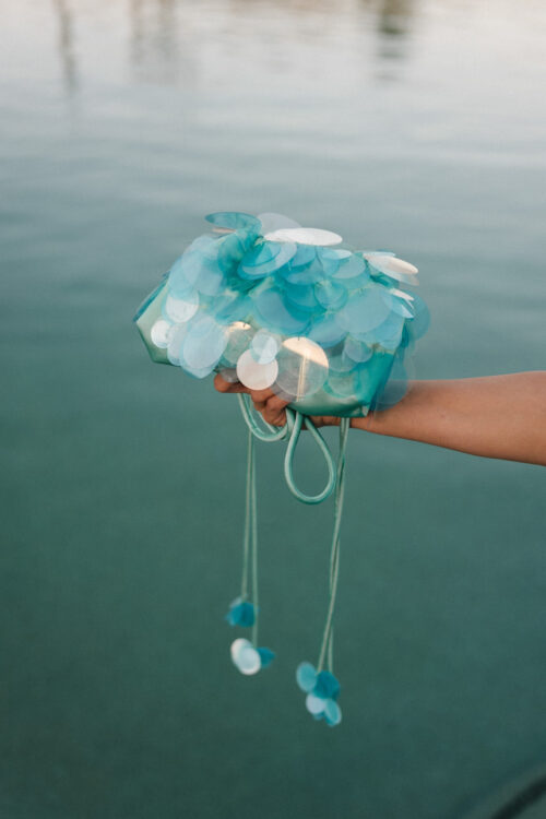 turquoise dress white blazer turquoise sequin handbag