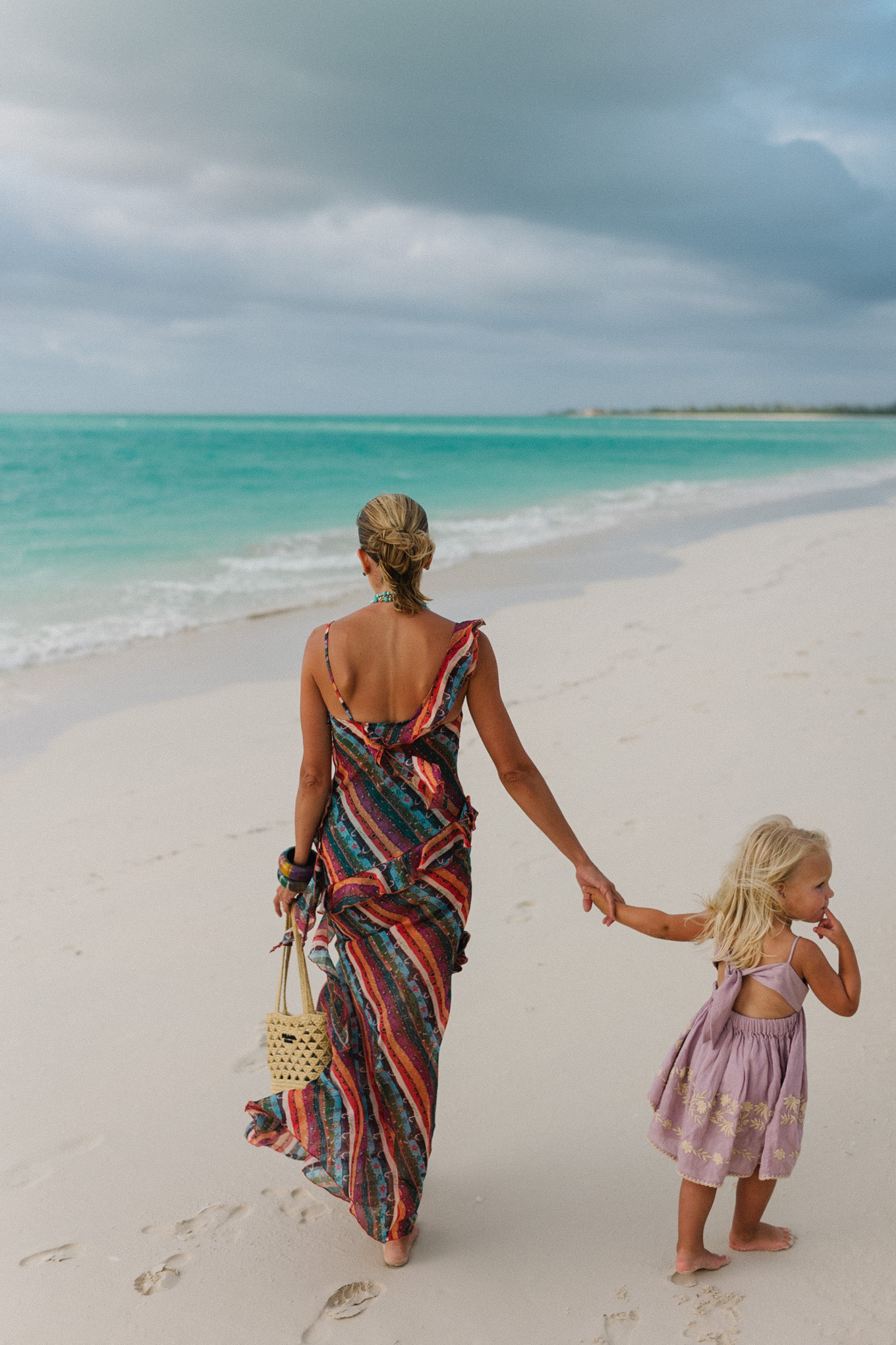 rainbow stripe ruffle maxi dress turquoise bead necklace woven bag