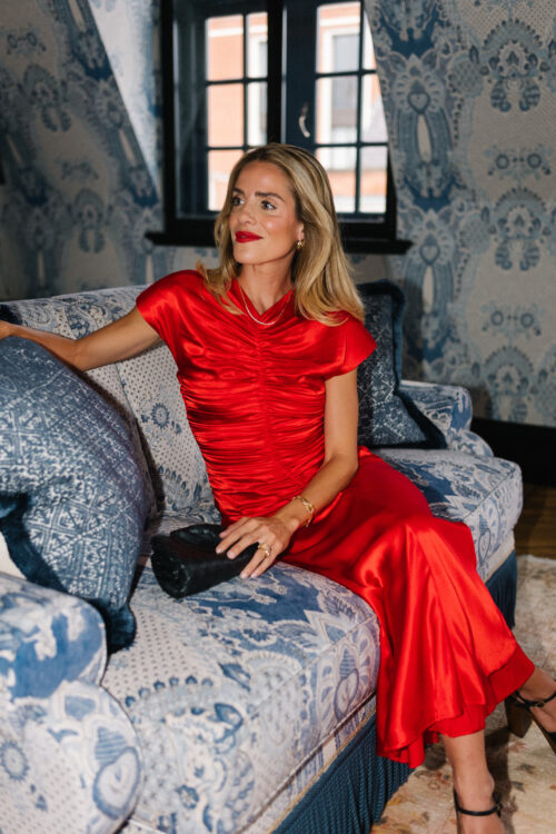 red silk midi dress black leather pouch black wooden heels