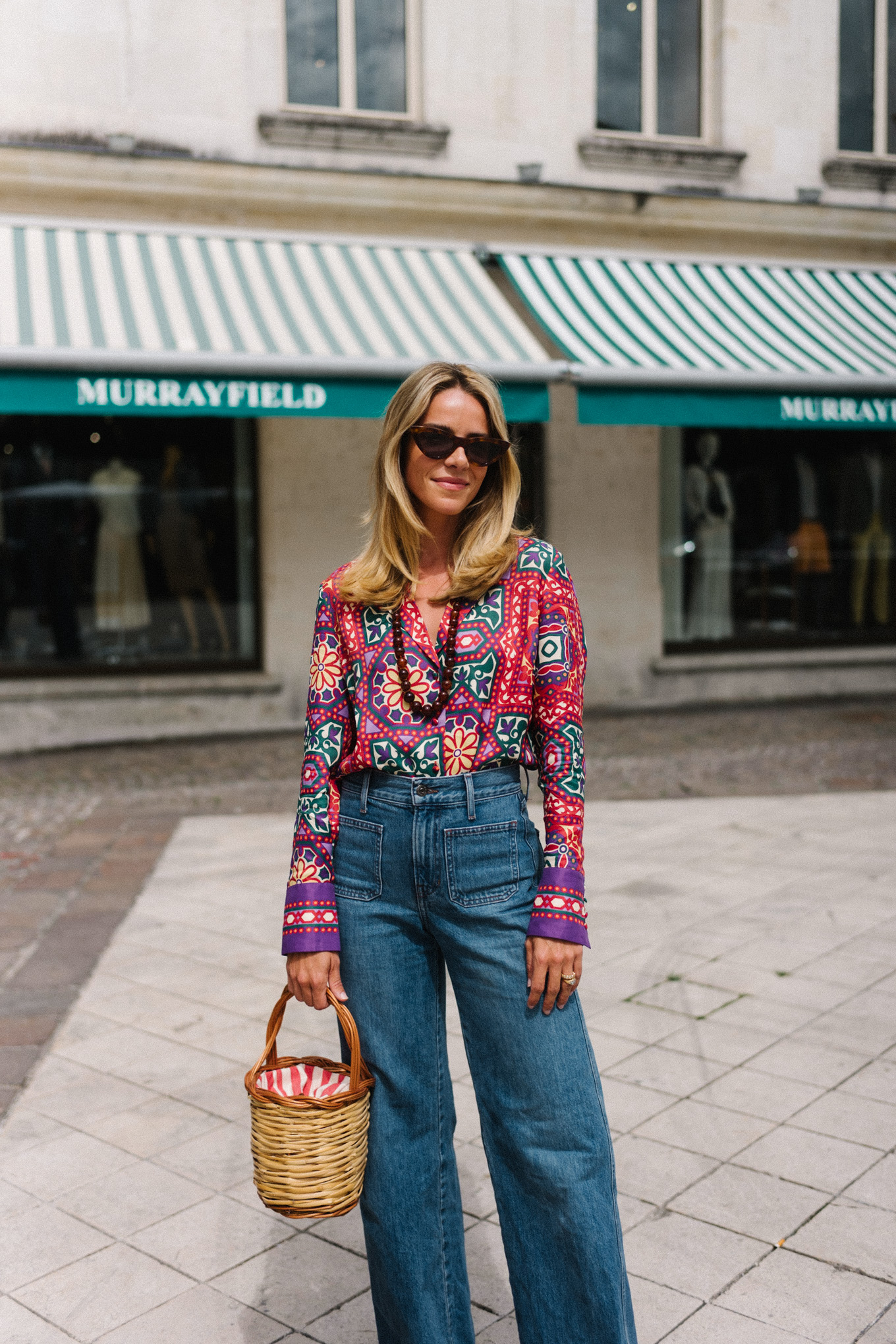 floral top blue flare denim yellow sneakers