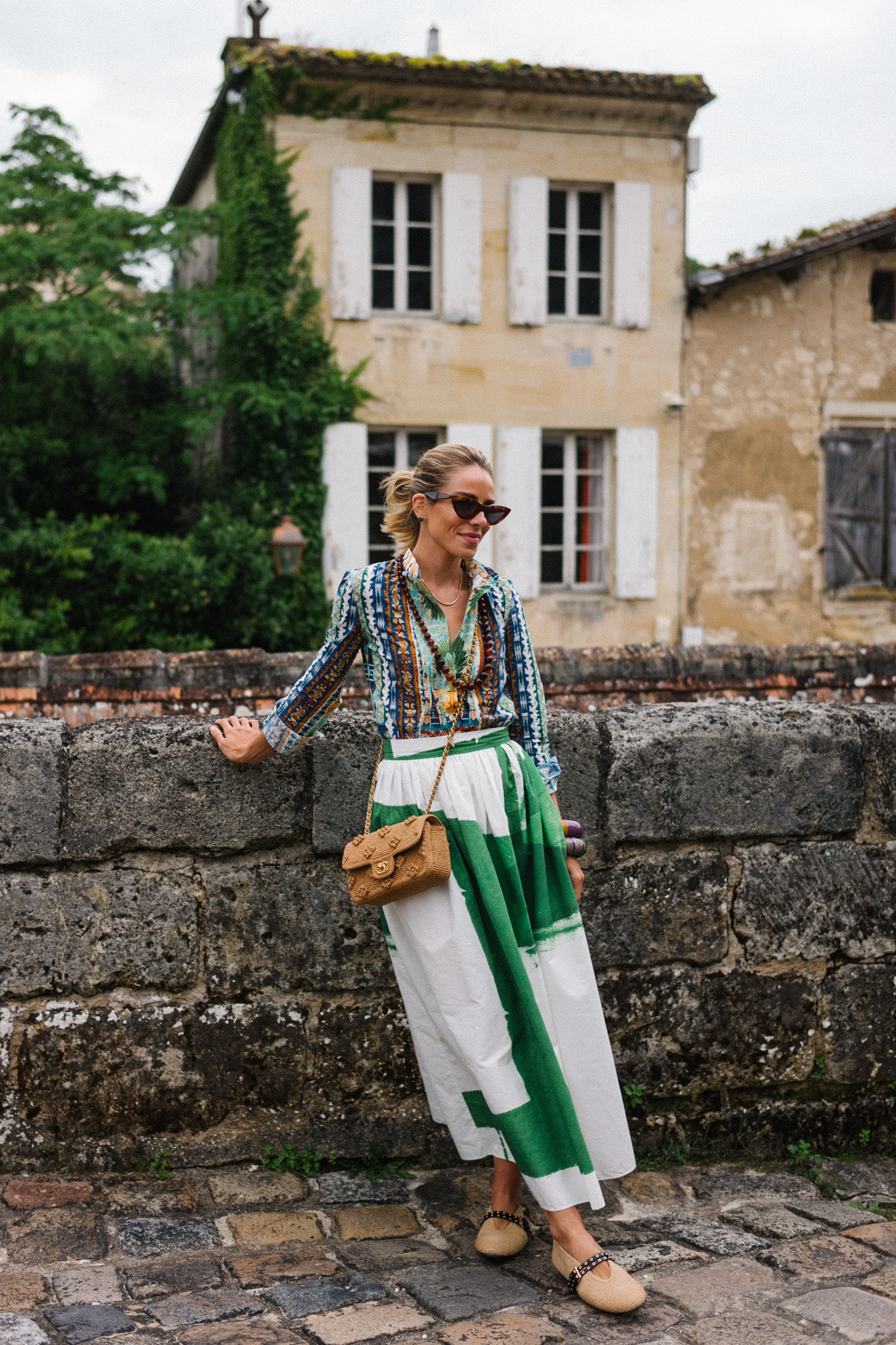 printed blouse green white maxi skirt straw bag rattan flats