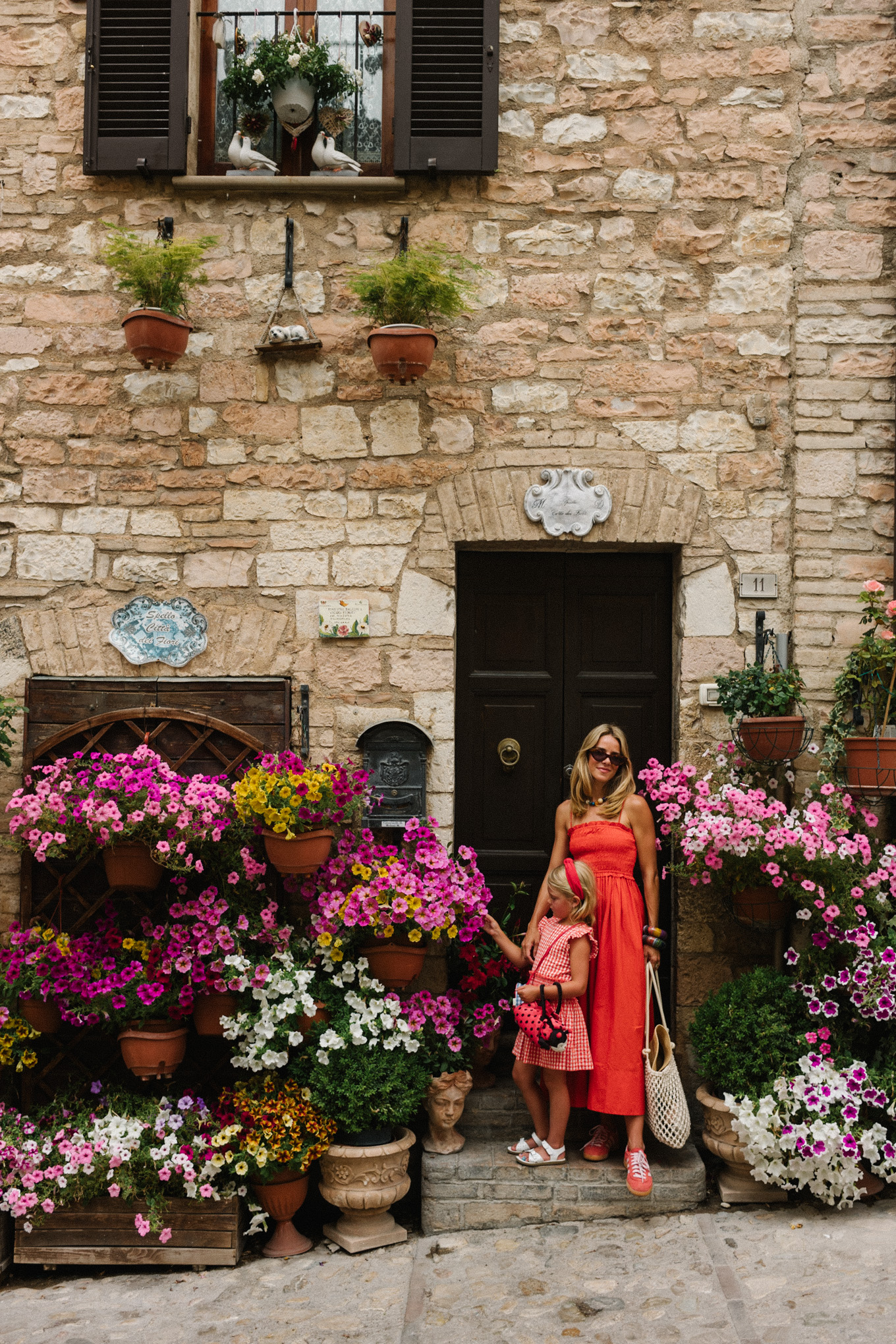 Red maxi dress, red sneakers, woven bag