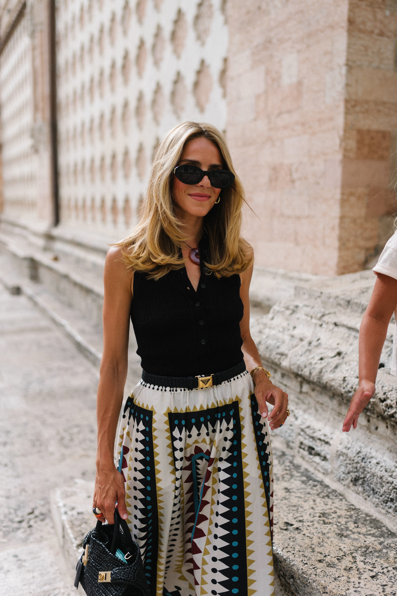 Black collared top, black and white geometric maxi skirt