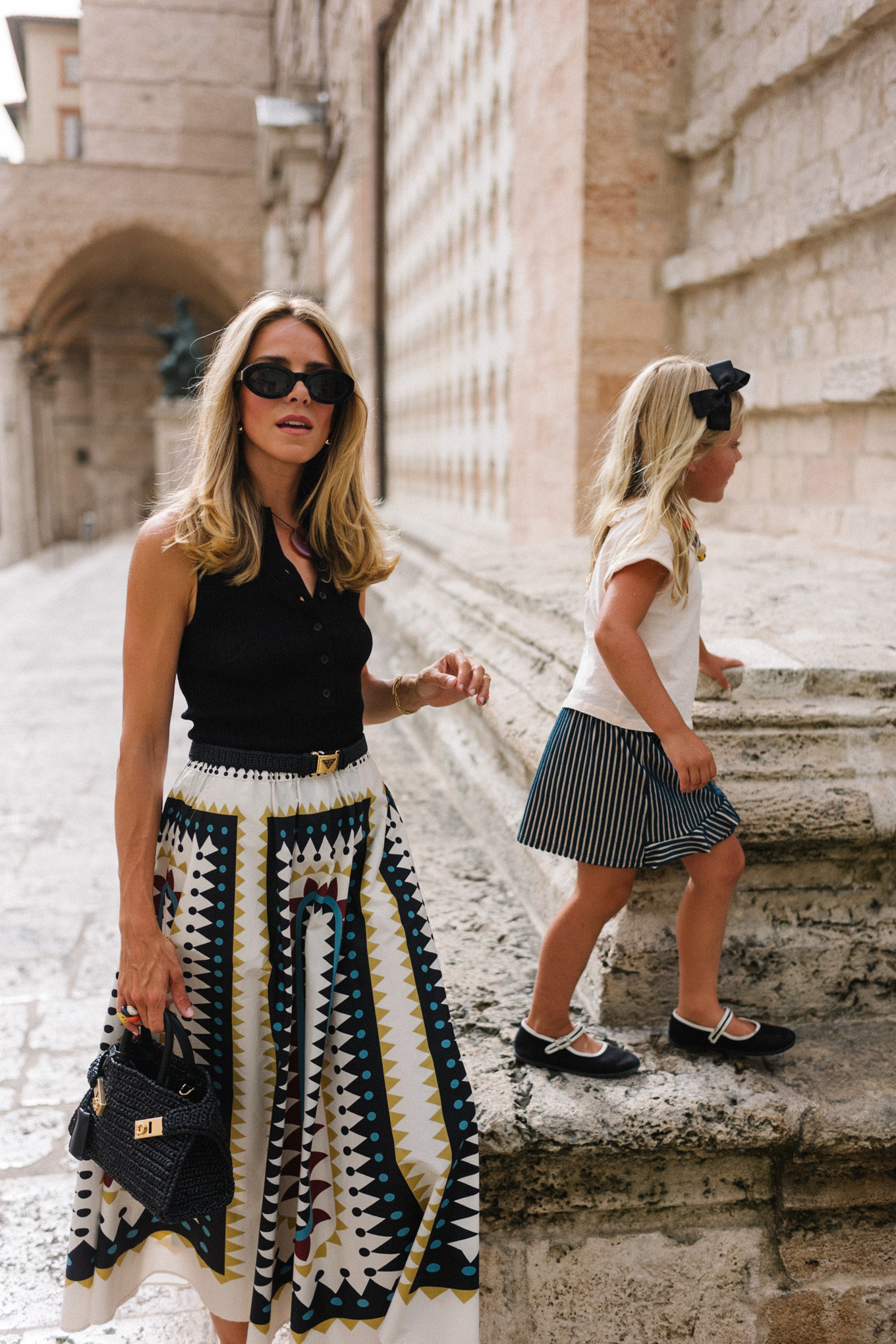 Black collared top, black and white geometric maxi skirt