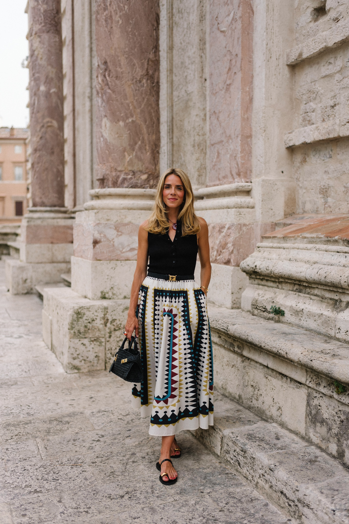 Black collared top, black and white geometric maxi skirt