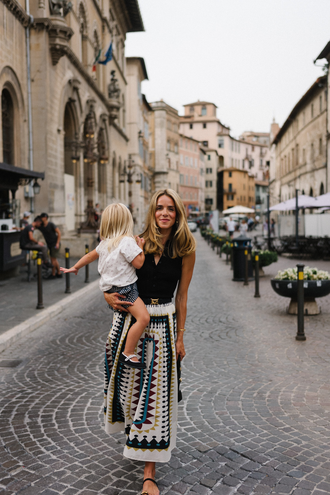 Black collared top, black and white geometric maxi skirt