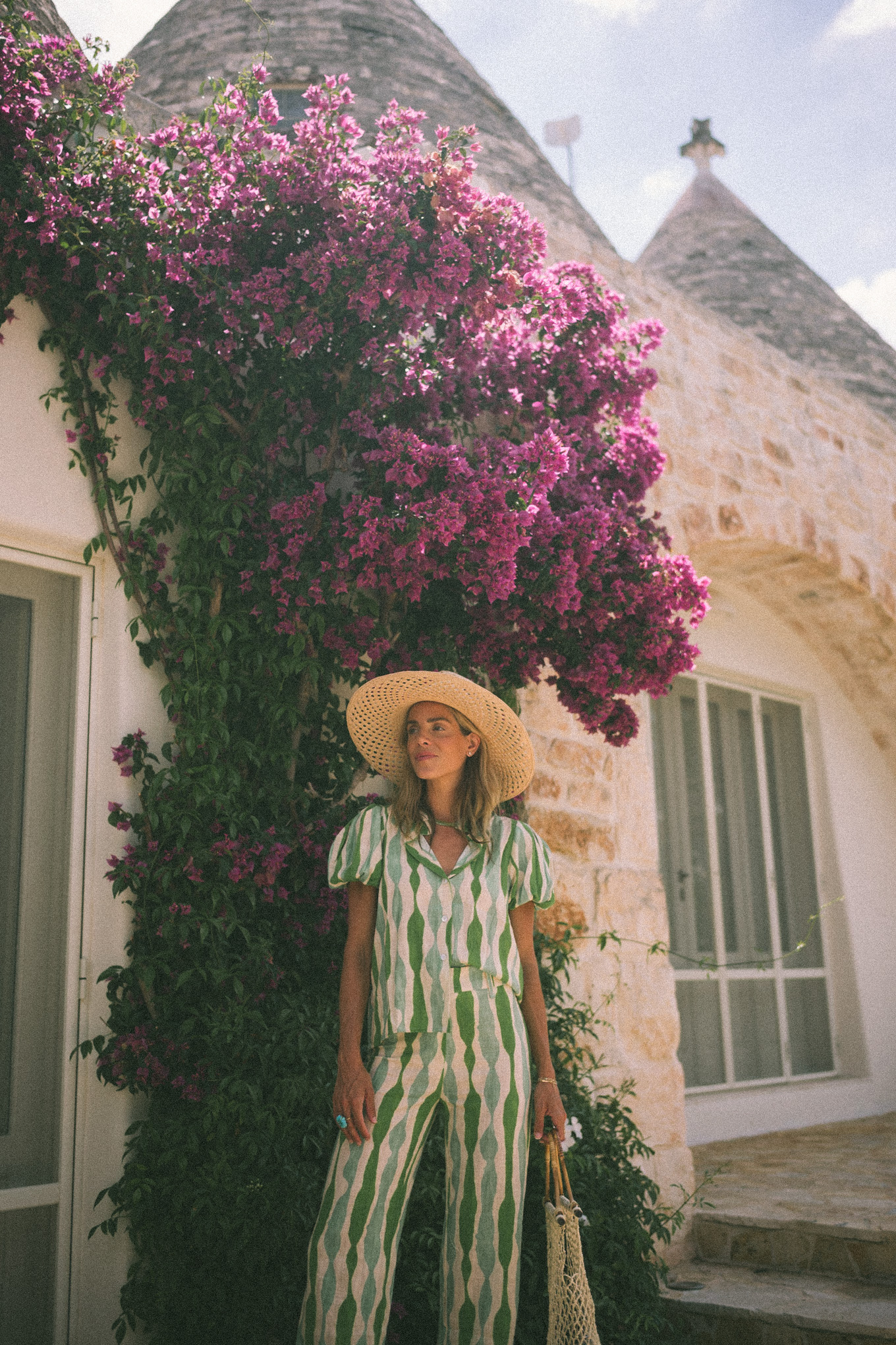 Green striped shirt and trousers, straw hat