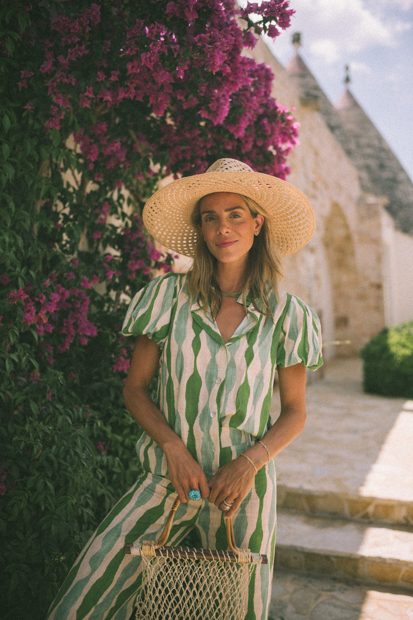 Green striped shirt and trousers, straw hat