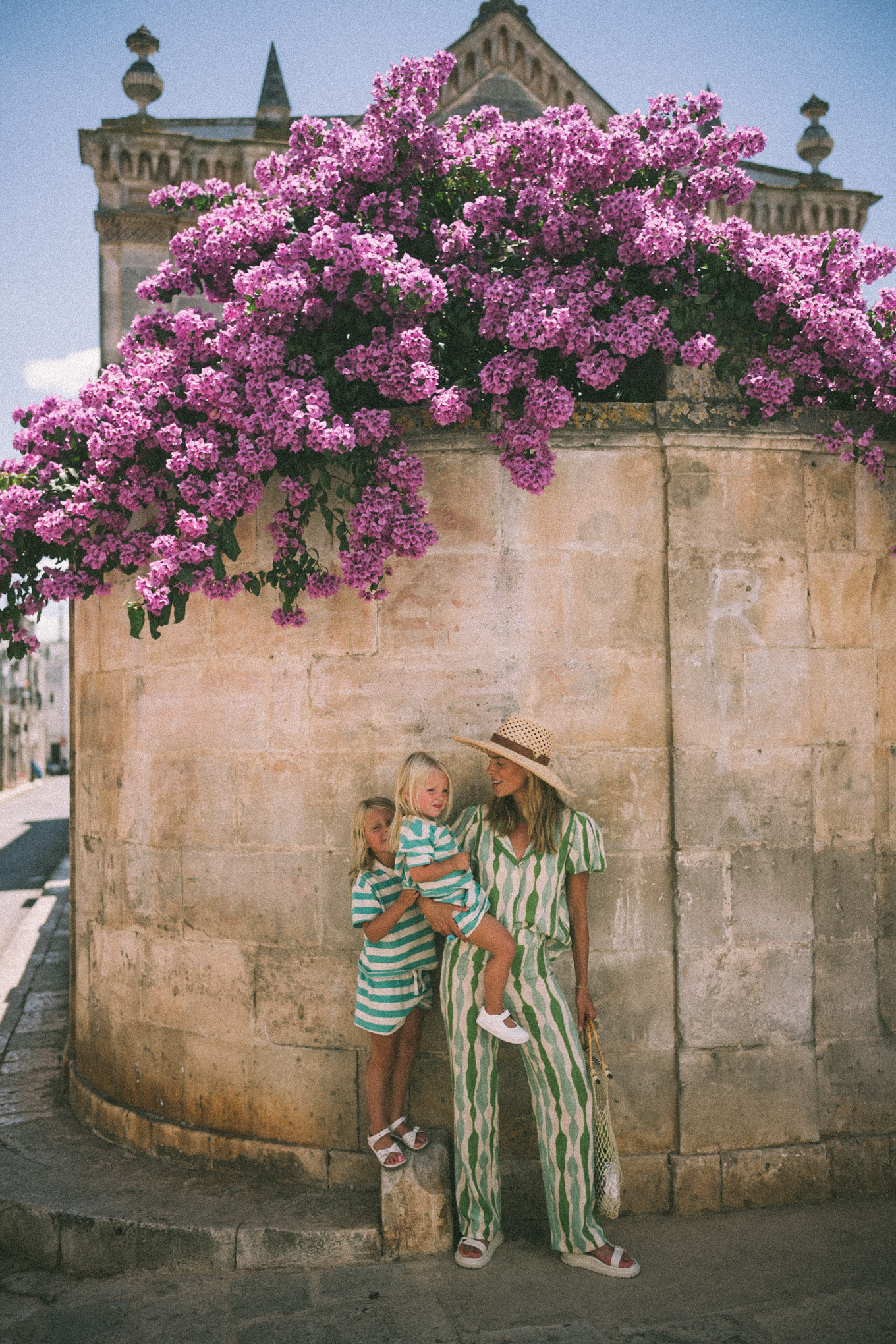 green striped shirt and pants straw hat