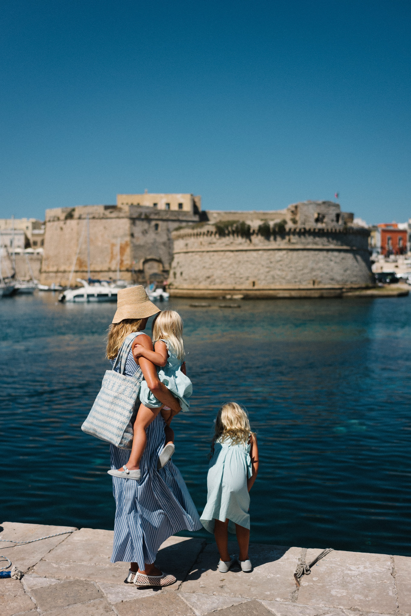 gallipoli puglia blue white striped sundress straw bucket hat