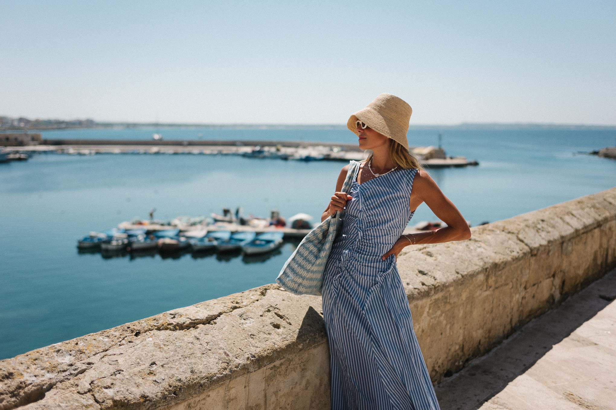 gallipoli puglia blue white striped sundress straw bucket hat