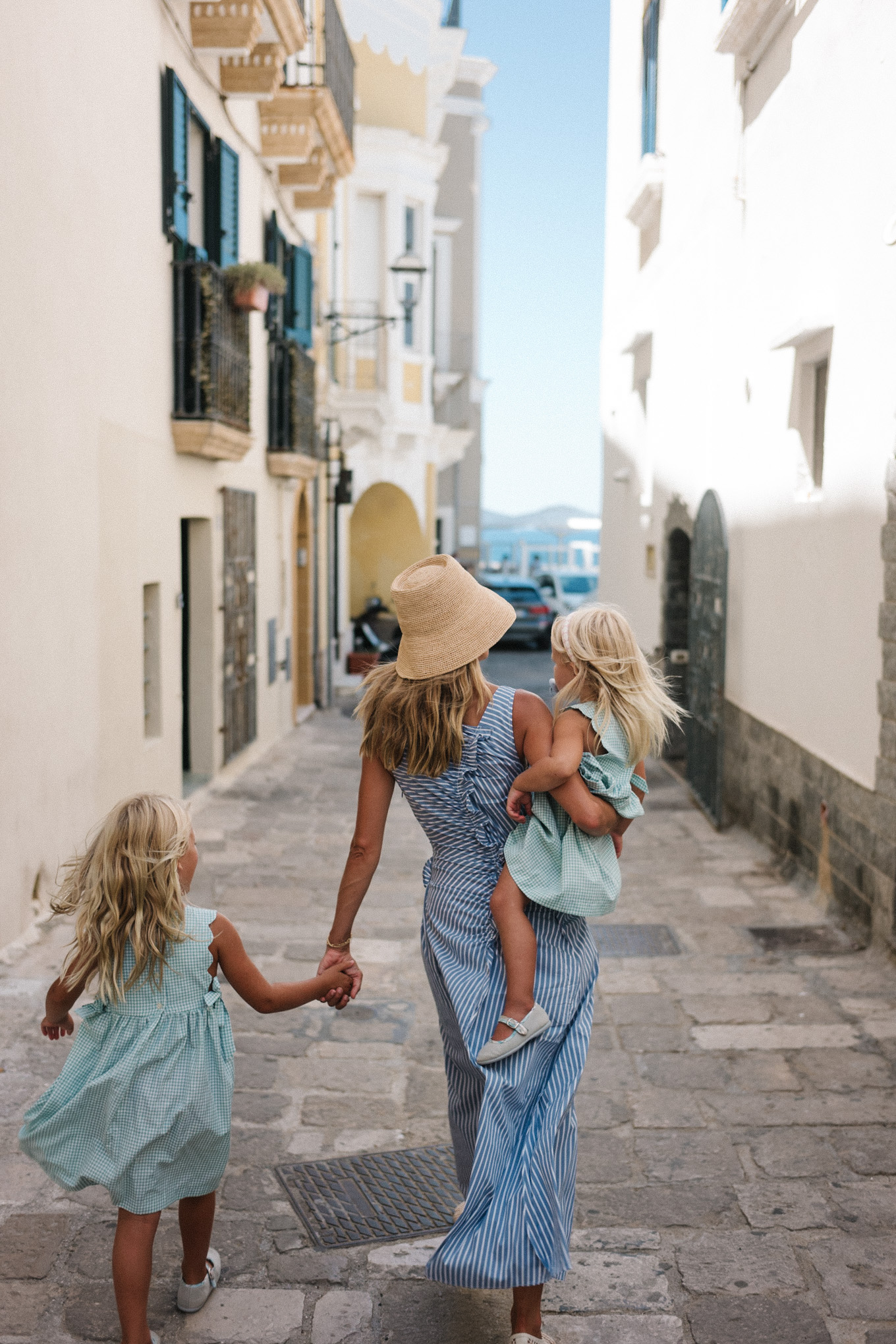 gallipoli puglia blue white striped sundress straw bucket hat