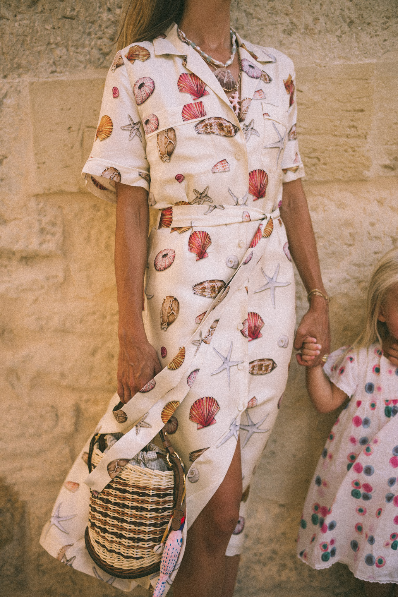 Shell shirt dress Shell necklace Leather sandals Basket bag