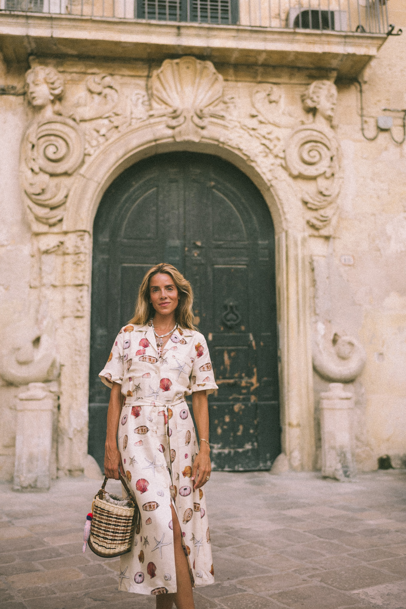 Shell shirt dress Shell necklace Leather sandals Basket bag