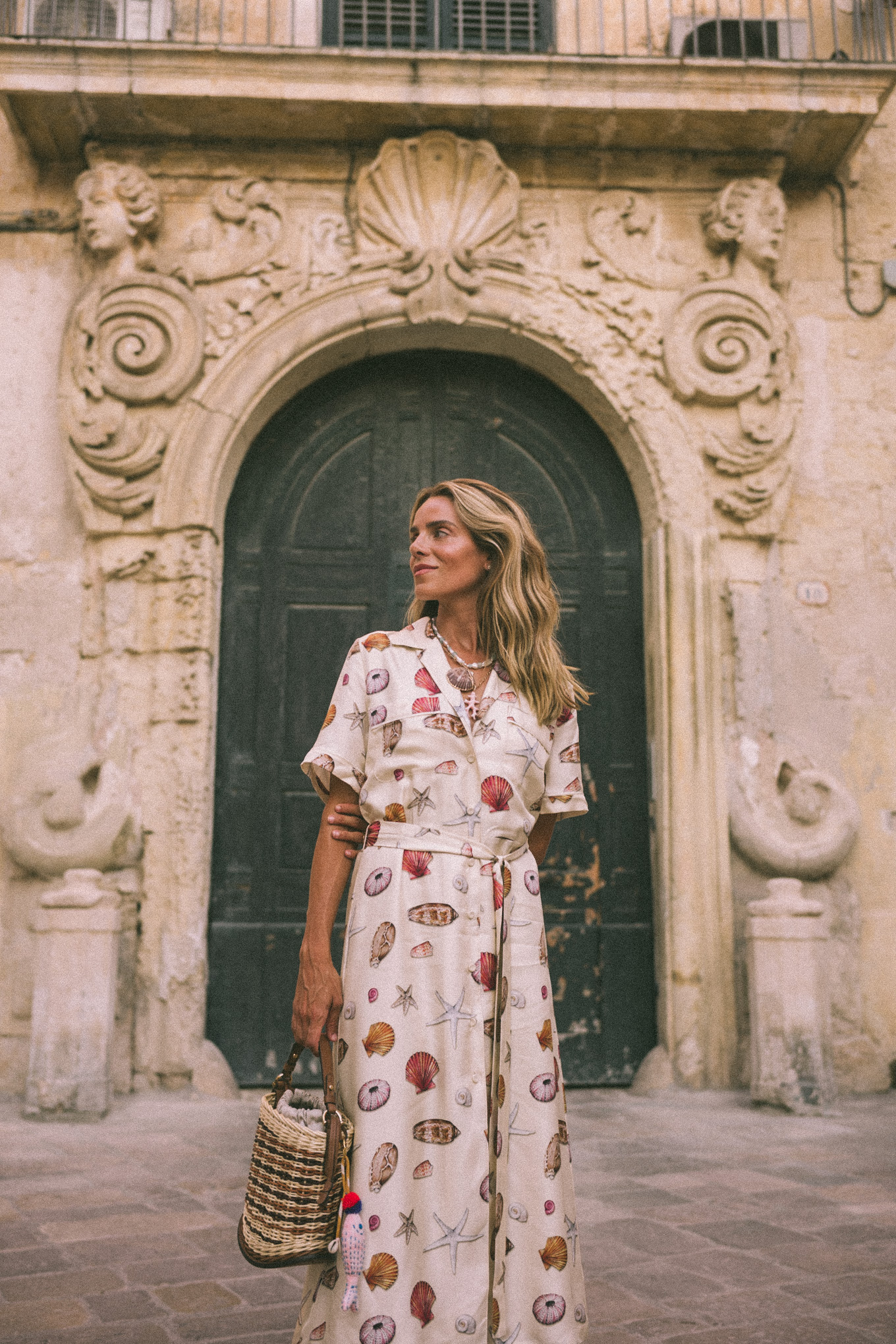 Shell shirt dress Shell necklace Leather sandals Basket bag