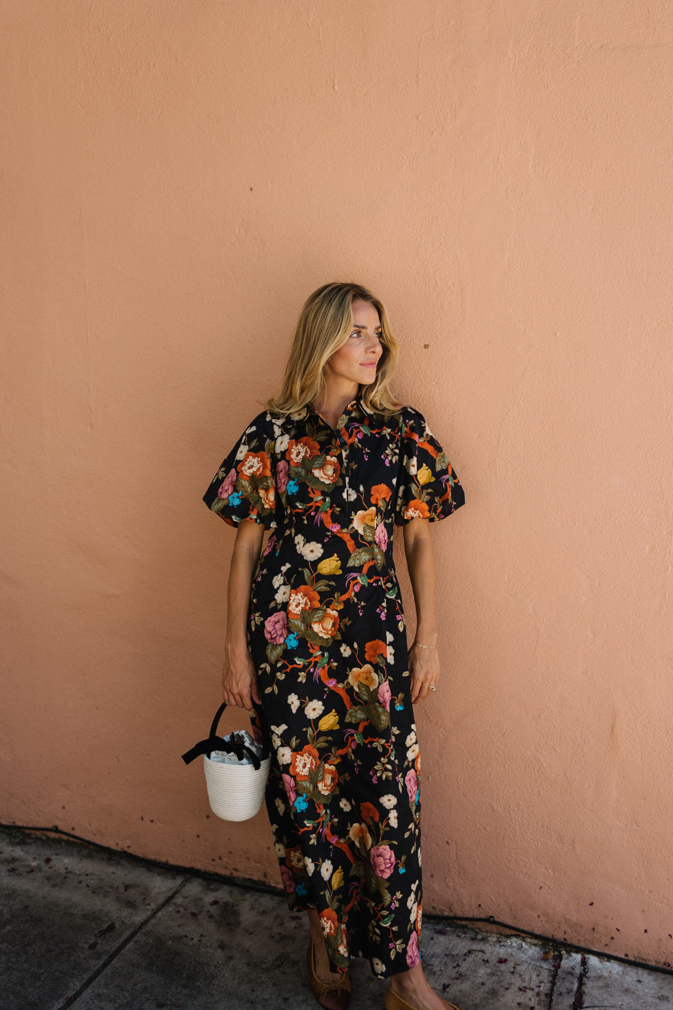 black floral puff sleeve maxi dress raffia bucket bag