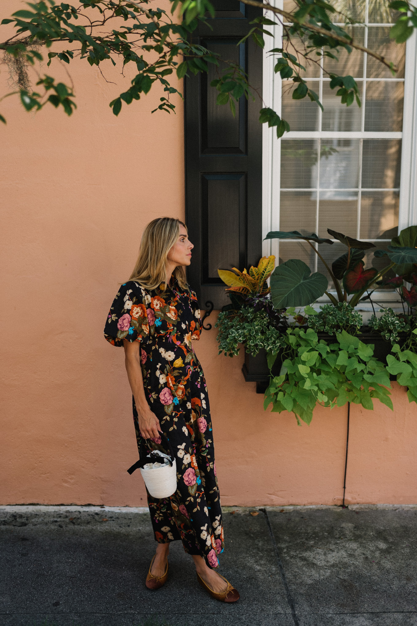 Black floral puff sleeve maxi dress Raffia bucket bag