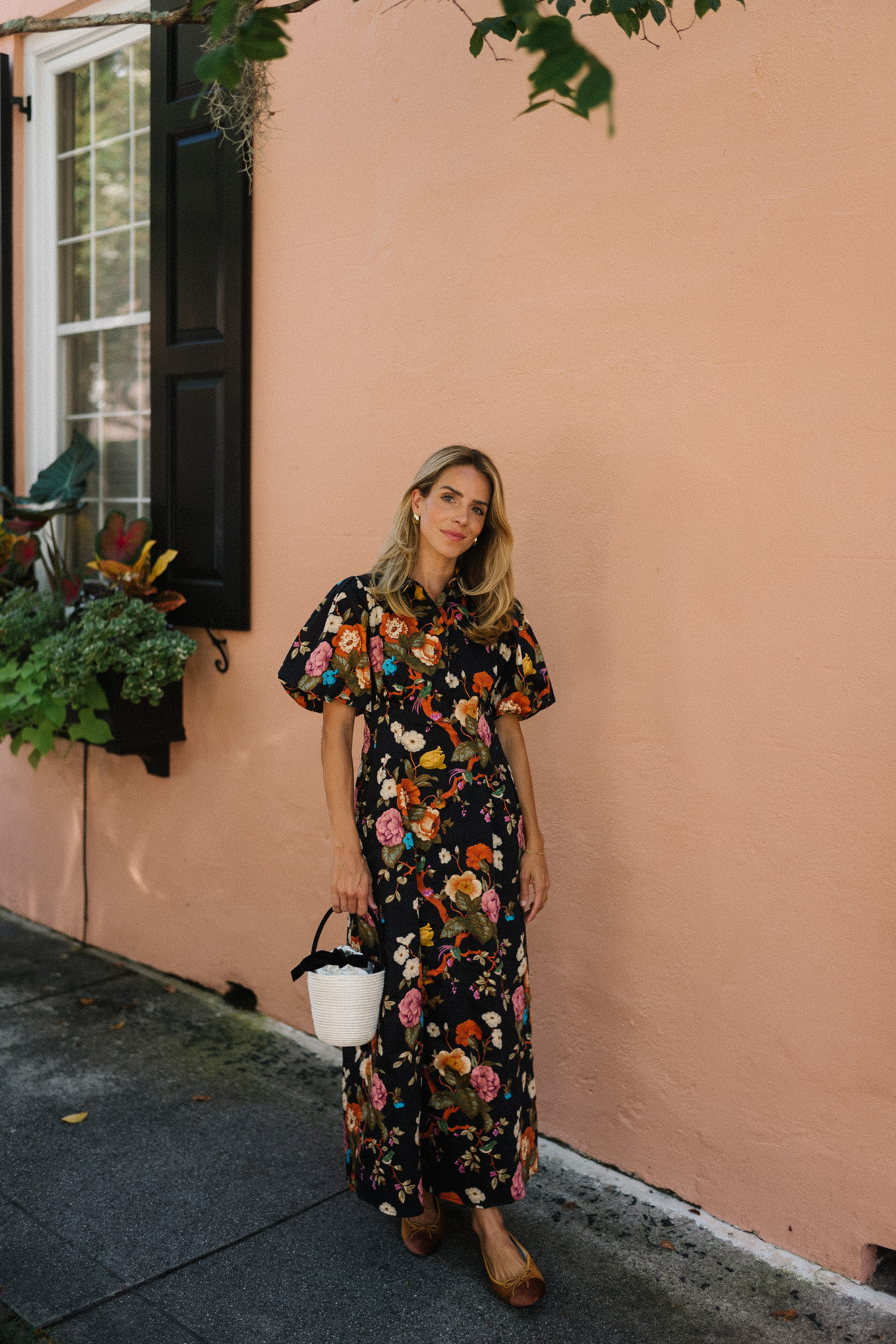 black floral puff sleeve maxi dress raffia bucket bag